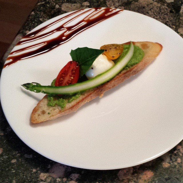 Amuse bouche. Pea poblano pesto, heirloom tomatoes, marinated bocconcini,…