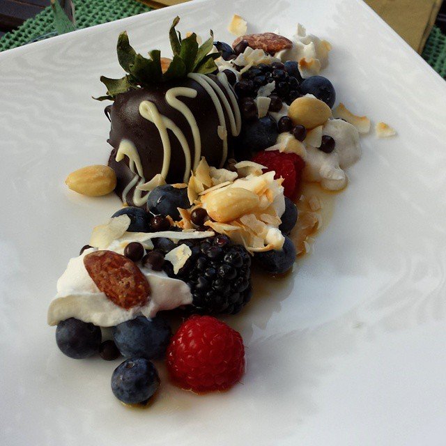 The dessert... Chocolate covered strawberries, fresh berries, almonds, Coconut,…