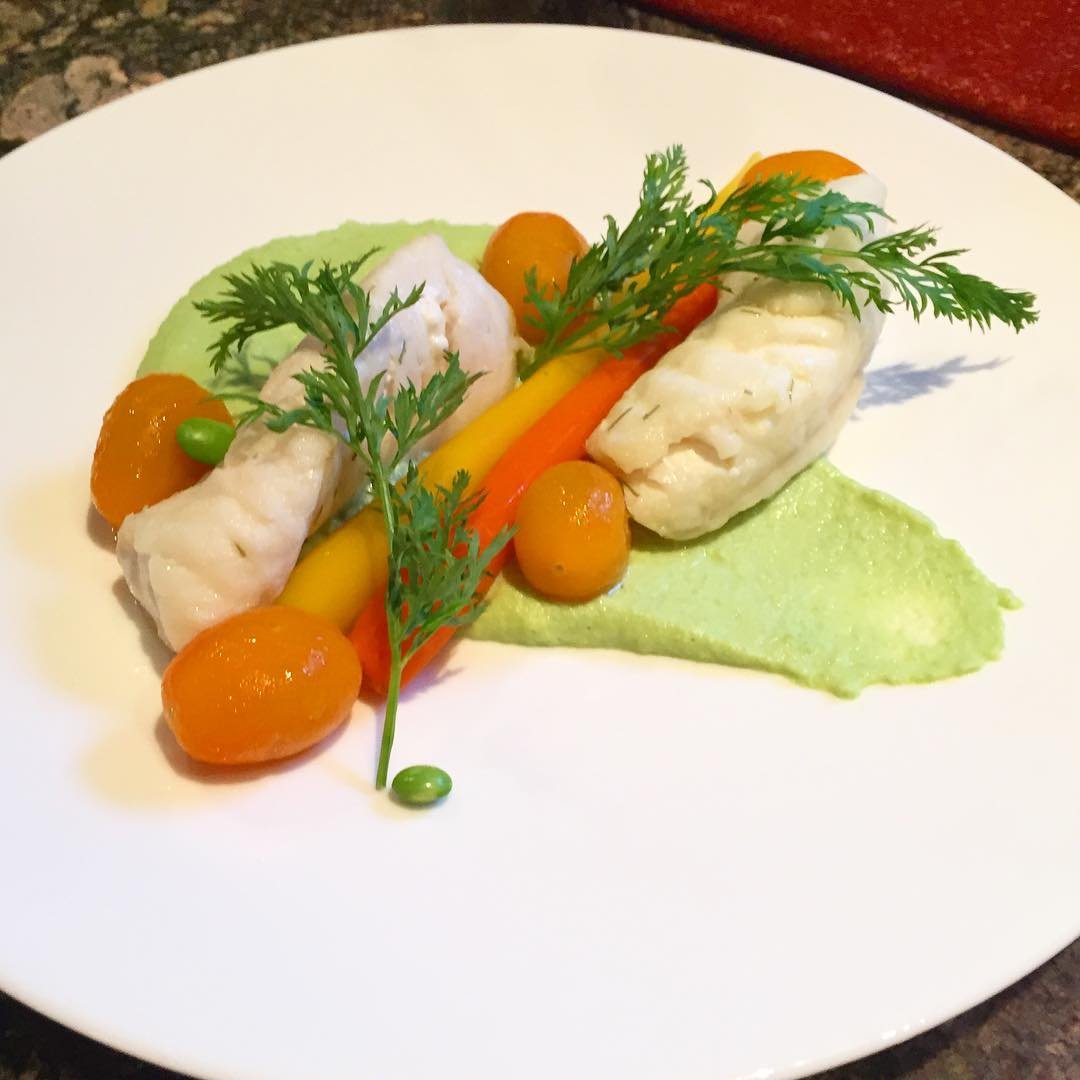 Lemon dill sous vide cod, avocado edamame purée, heirloom carrots, peeled…