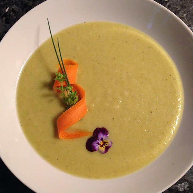 The finished product... Curried zucchini soup with kale, apple, and coconut.…